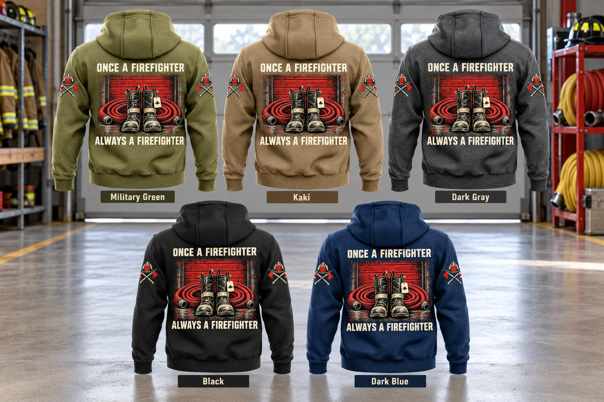 Five separate complete back views of the Firefighter Once and Always Vintage Hoodie in Military Green, Kaki, Dark Gray, Black and Dark Blue, each labelled beneath, with matching boots-and-hose artwork in a quiet firehouse bay with equipment at rest.