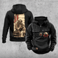 Firefighter Workday Portrait Vintage Hoodie in Black, front and back views with sample chest text CUSTOM NAME and SINCE 2000, helmet and crossed-axes chest artwork, plain sleeves and pouch, and a tall kneeling-firefighter back illustration.