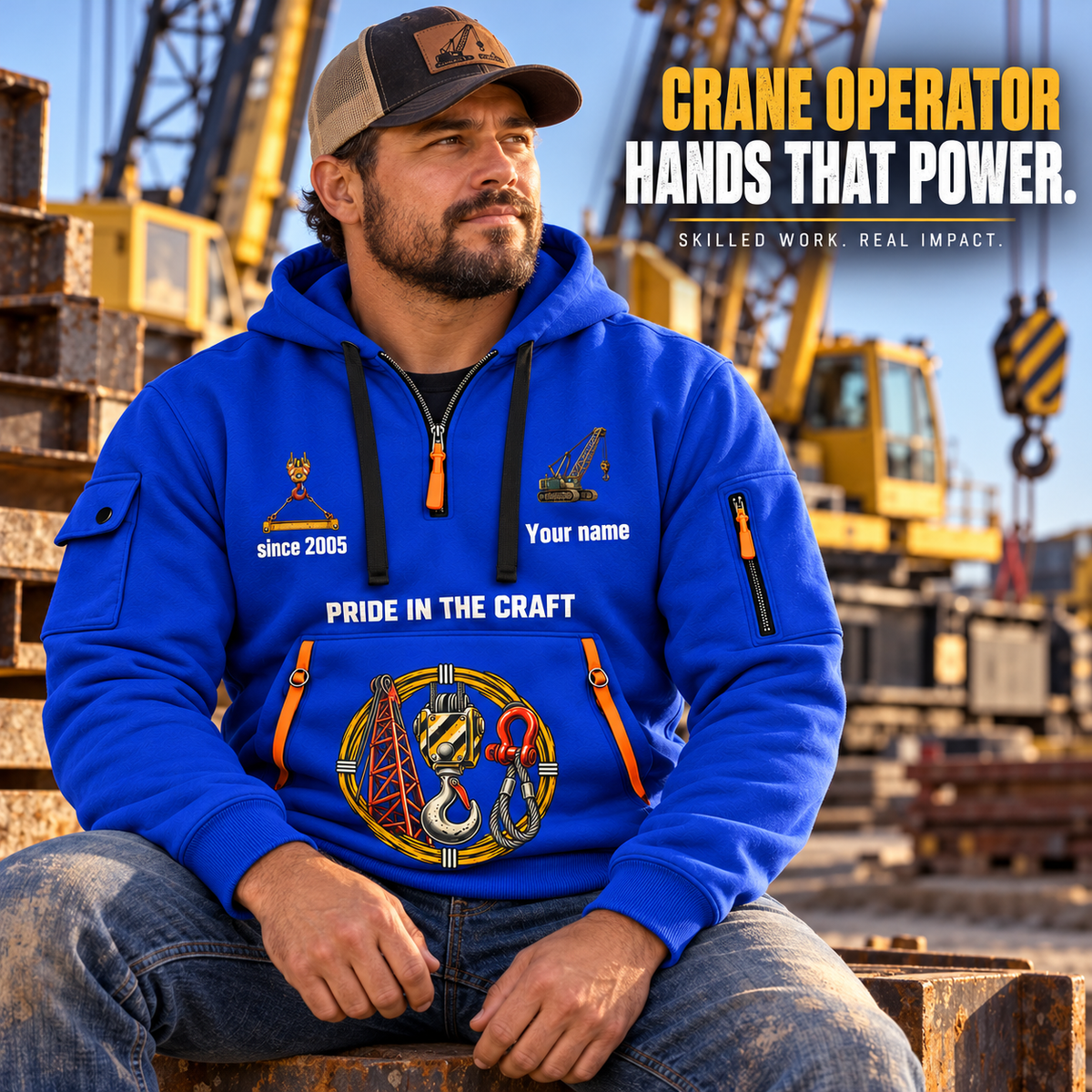 Crane Operator Hands That Power Quarter-Zip Hoodie in Blue, worn by an adult male model, preserving the current niche artwork, sample name and year, and hooded quarter-zip garment details.