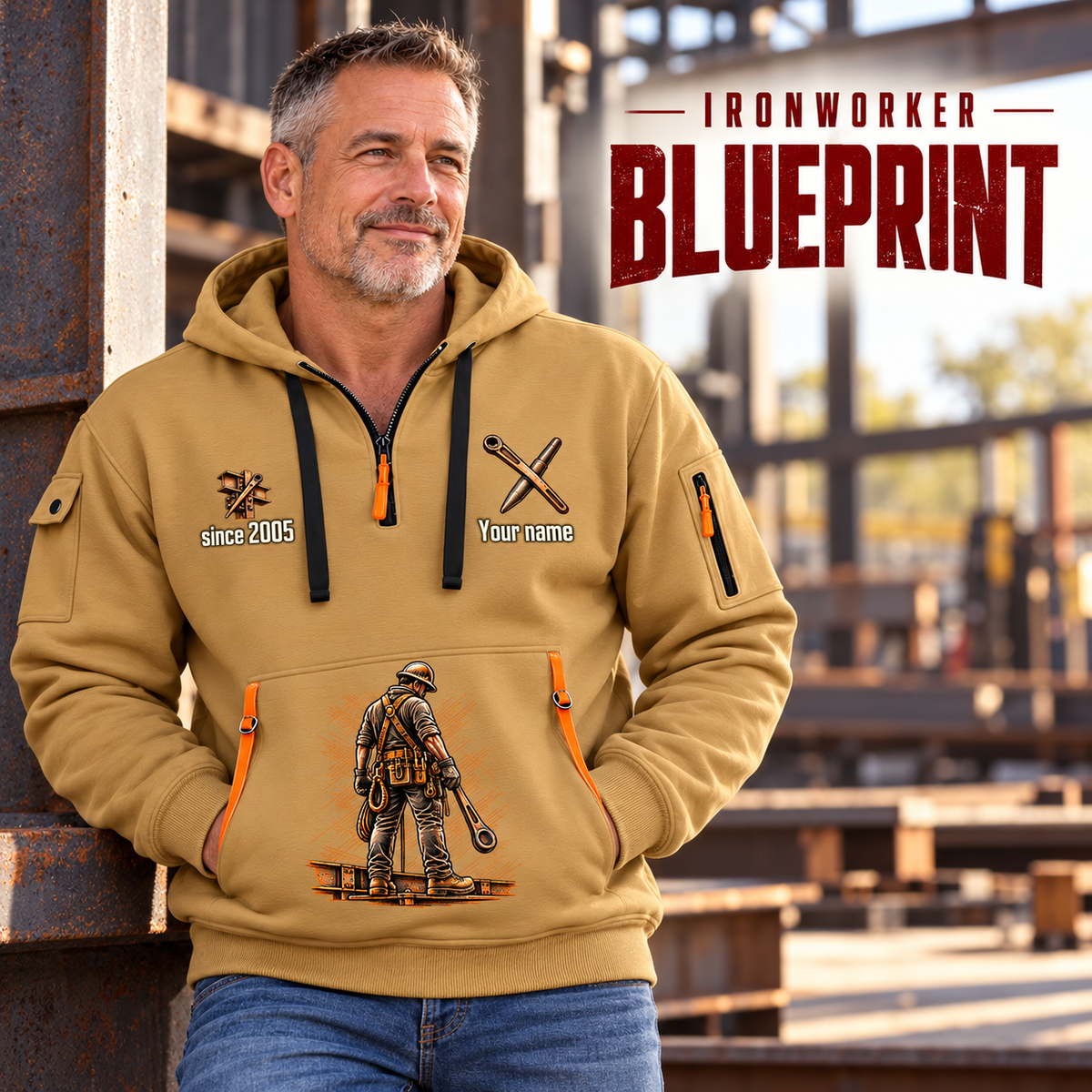 Ironworker Blueprint Quarter-Zip Hoodie in Khaki, worn by an adult male model, preserving the current niche artwork, sample name and year, and hooded quarter-zip garment details.