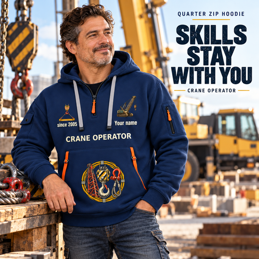 Crane Operator Skills Stay With You Quarter-Zip Hoodie in Navy, worn by an adult male model, preserving the current niche artwork, sample name and year, and hooded quarter-zip garment details.