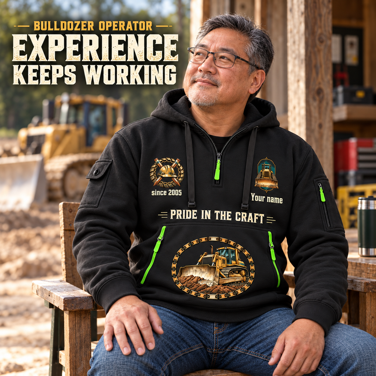 Bulldozer Operator Experience Keeps Working Quarter-Zip Hoodie in Black, worn by an adult male model, preserving the current niche artwork, sample name and year, and hooded quarter-zip garment details.