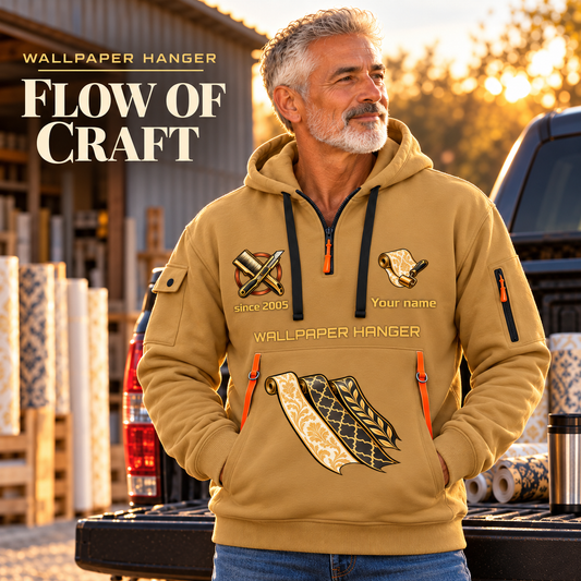 Wallpaper Hanger Flow of Craft Quarter-Zip Hoodie in Khaki, worn by an adult male model, preserving the current niche artwork, sample name and year, and hooded quarter-zip garment details.
