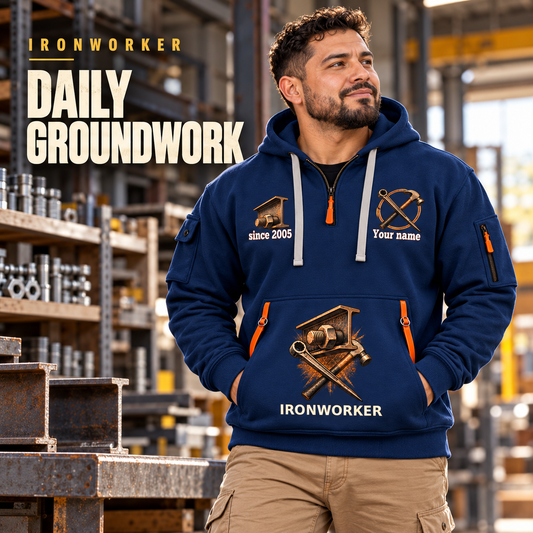 Ironworker Daily Groundwork Quarter-Zip Hoodie in Navy, worn by an adult male model, preserving the current niche artwork, sample name and year, and hooded quarter-zip garment details.