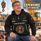 Crane Operator Experience Keeps Working Quarter-Zip Hoodie in Black, worn by an adult male model, preserving the current niche artwork, sample name and year, and hooded quarter-zip garment details.
