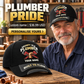 Plumber wearing a personalized Grumpy Old baseball cap with custom name