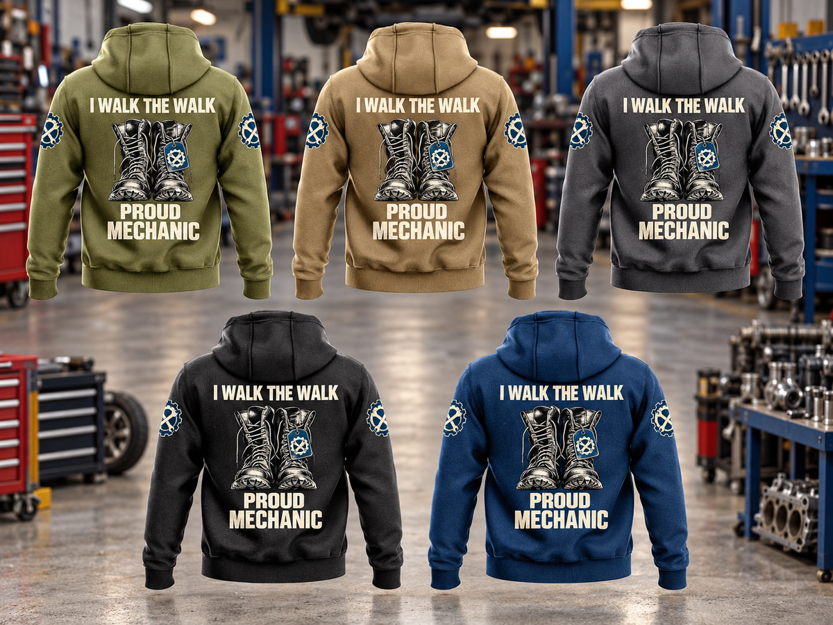 Five complete back views of Mechanic Proud Walk Vintage Hoodie in Military Green, Kaki, Dark Gray, Black and Dark Blue, arranged in a vehicle workshop with boots artwork and I WALK THE WALK / PROUD / MECHANIC lettering.