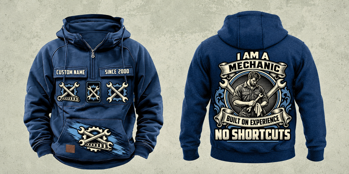 Mechanic Heritage Crest Vintage Hoodie in Dark Blue, complete front and back views with crossed-wrench and gear artwork, sample chest text CUSTOM NAME and SINCE 2000, and plain sleeves.