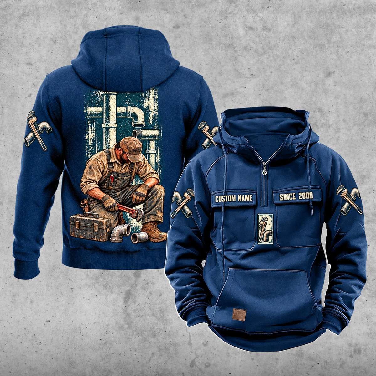 Plumber Daily Commitment Portrait Vintage Hoodie in Dark Blue, front and back views with sample chest text CUSTOM NAME and SINCE 2000, a tall pipework panel and kneeling plumber back illustration, and small wrench-and-fitting sleeve motifs.