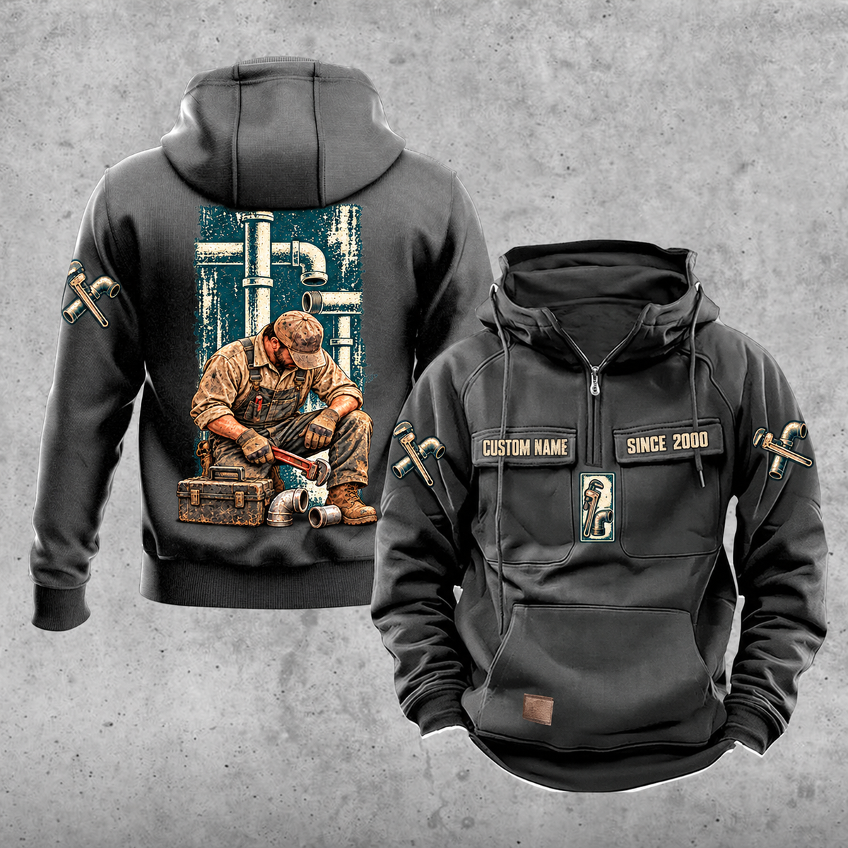 Plumber Daily Commitment Portrait Vintage Hoodie in Dark Gray, front and back views with sample chest text CUSTOM NAME and SINCE 2000, a tall pipework panel and kneeling plumber back illustration, and small wrench-and-fitting sleeve motifs.