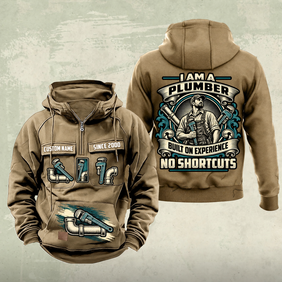Plumber Heritage Crest Vintage Hoodie in Kaki, front and back views with cream and muted teal plumbing artwork and sample chest text CUSTOM NAME and SINCE 2000.