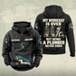 Plumber Never Ends Vintage Hoodie in Black, front and back views with work boots, pipe wrench and fittings artwork, and sample chest text CUSTOM NAME and SINCE 2000.