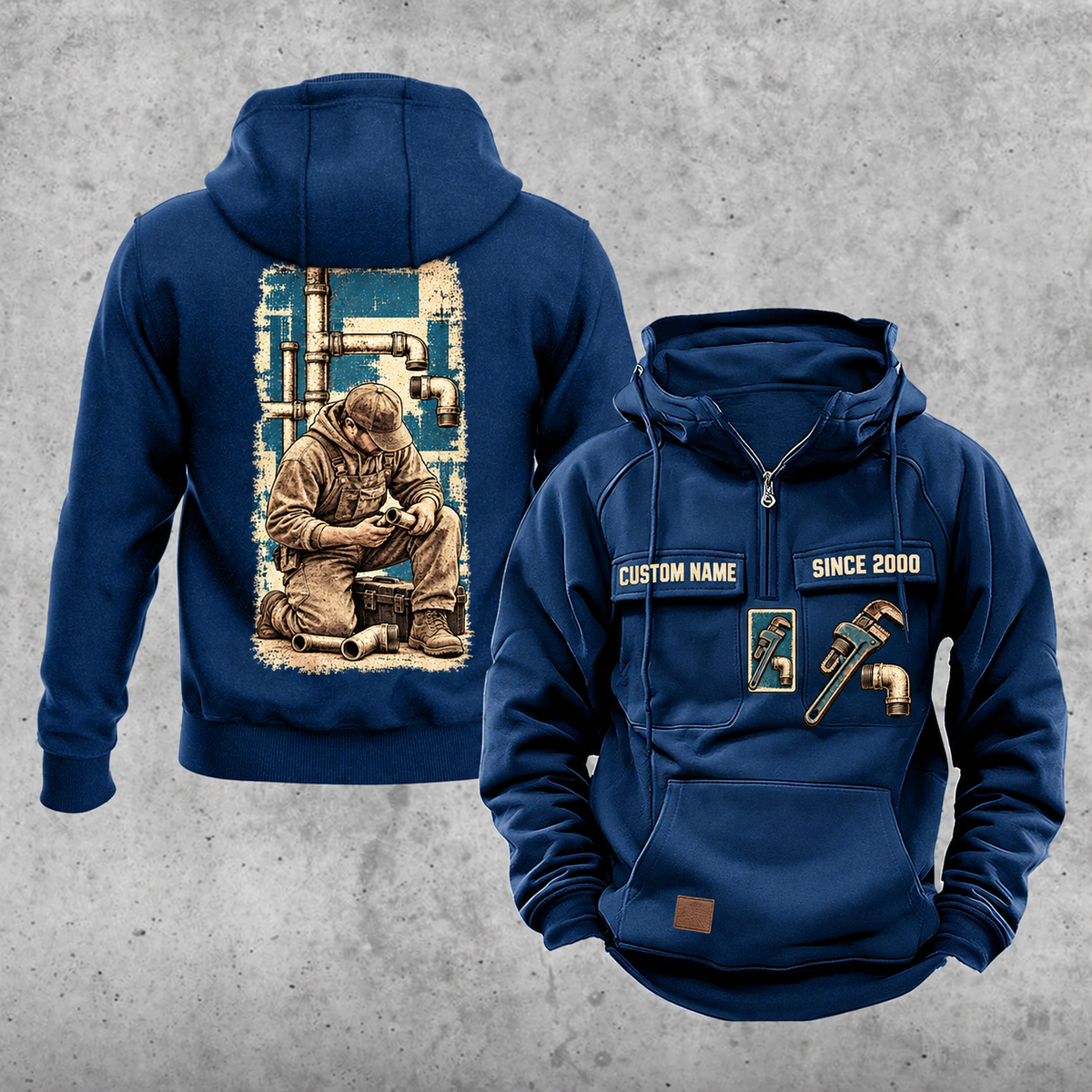 Plumber Workday Portrait Vintage Hoodie in Dark Blue, front and back views with sample text CUSTOM NAME and SINCE 2000, chest wrench emblems and a tall kneeling-plumber back panel.