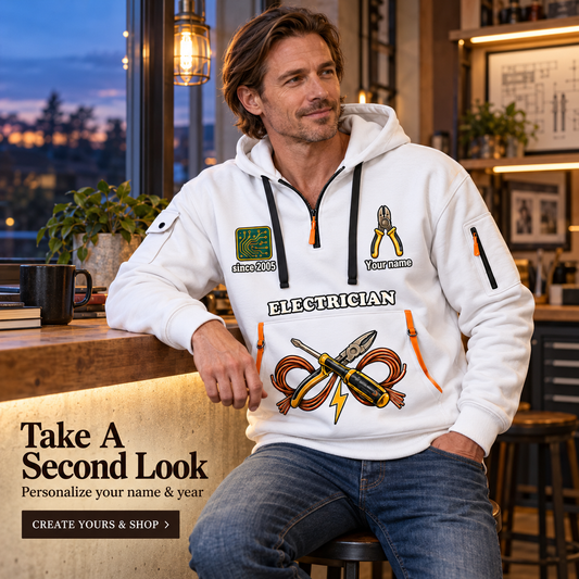 Electrician Built With Skill Name & Year Quarter-Zip Hoodie in White, worn by an adult man