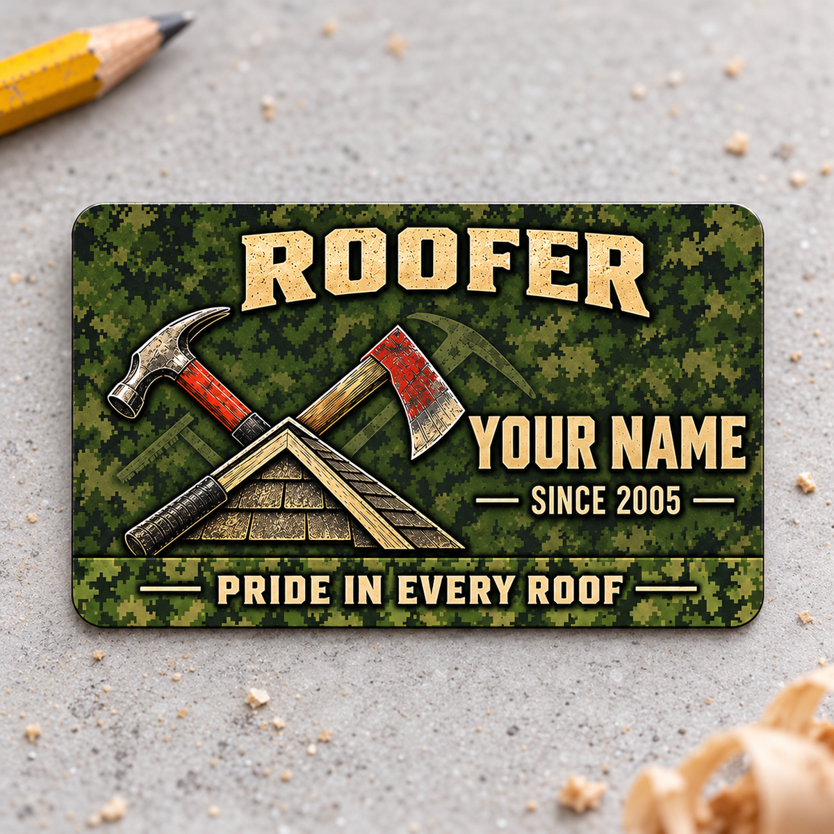 Front of the Roofer Rugged Field Pride aluminum wallet card on a subtle tabletop.