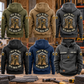 Roofer Walk the Walk Badge Vintage Hoodie in Military Green, Kaki, Dark Gray, Black and Dark Blue, shown as five complete back views plus a Dark Gray front view above a roofing workbench with stacked shingles.