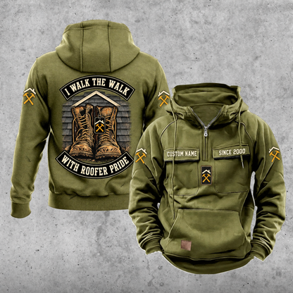 Roofer Walk the Walk Badge Vintage Hoodie in Military Green, front and back views with sample text CUSTOM NAME and SINCE 2000, roofline and crossed-hammer sleeve motifs, and a boots badge between curved I WALK THE WALK and WITH ROOFER PRIDE banners.