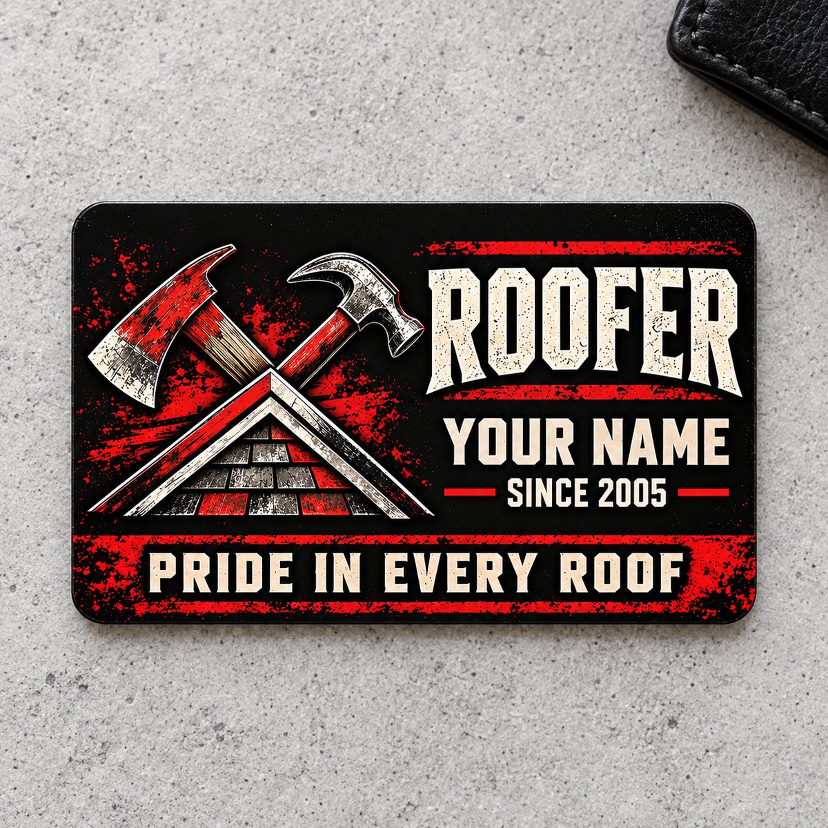Roofer Midnight Pride aluminum wallet card, front artwork on pale gray concrete.