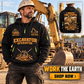 Excavator Operator wearing Work the Earth quarter-zip hoodie in their workplace; product introduction and shopping call to action