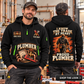 Plumber wearing Walk The Workshop quarter-zip hoodie in their workplace; product introduction and shopping call to action