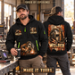 Welder wearing Weathered Steel Emblem quarter-zip hoodie in their workplace; product introduction and shopping call to action