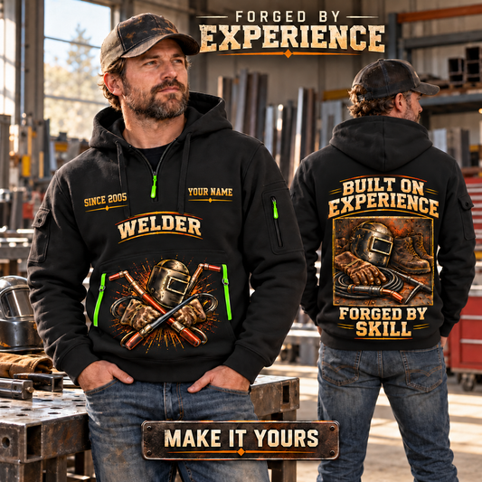Welder wearing Built on Experience quarter-zip hoodie in their workplace; product introduction and shopping call to action
