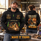 Welder wearing Workshop Trailblazer quarter-zip hoodie in their workplace; product introduction and shopping call to action