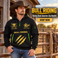 Bull Riding wearing Bull Riding Rodeo Rush Quarter-Zip Hoodie with Name and Year - BR17365536 quarter-zip hoodie in their workplace; product introduction and shopping call to action