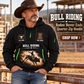 Bull Riding wearing Bull Riding Rodeo Never Ends Quarter-Zip Hoodie with Name and Year - BR17557344 quarter-zip hoodie in their workplace; product introduction and shopping call to action