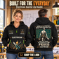 Electrician wearing Built For The Everyday quarter-zip hoodie in their workplace; product introduction and shopping call to action