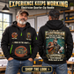 Electrician wearing Experience Keeps Working quarter-zip hoodie in their workplace; product introduction and shopping call to action