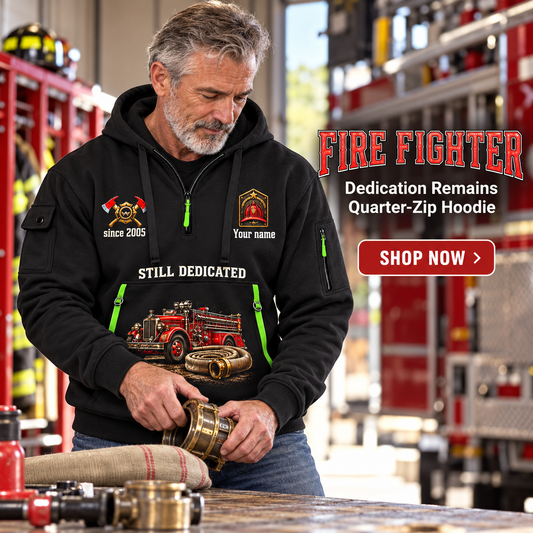 Fire Fighter wearing Dedication Remains quarter-zip hoodie in their workplace; product introduction and shopping call to action