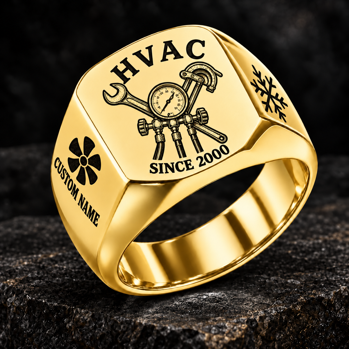 Gold HVAC Heritage Emblem signet ring featuring a pressure-gauge and service-tool emblem, with fan and snowflake shoulder details, with illustrative CUSTOM NAME and SINCE 2000