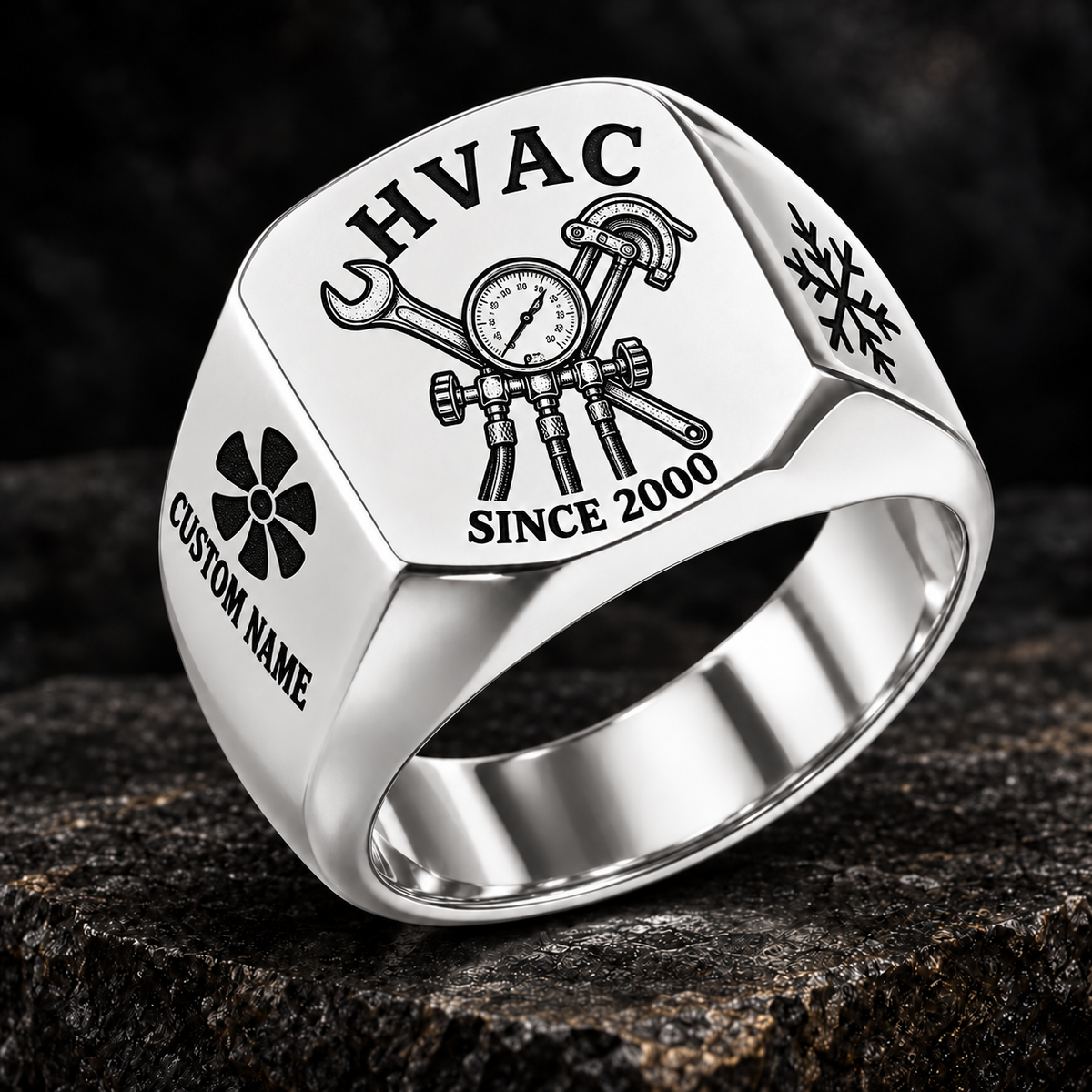 Silver HVAC Heritage Emblem signet ring featuring a pressure-gauge and service-tool emblem, with fan and snowflake shoulder details, with illustrative CUSTOM NAME and SINCE 2000