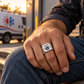 Silver HVAC Sunburst Legacy ring worn in an off-duty lifestyle setting