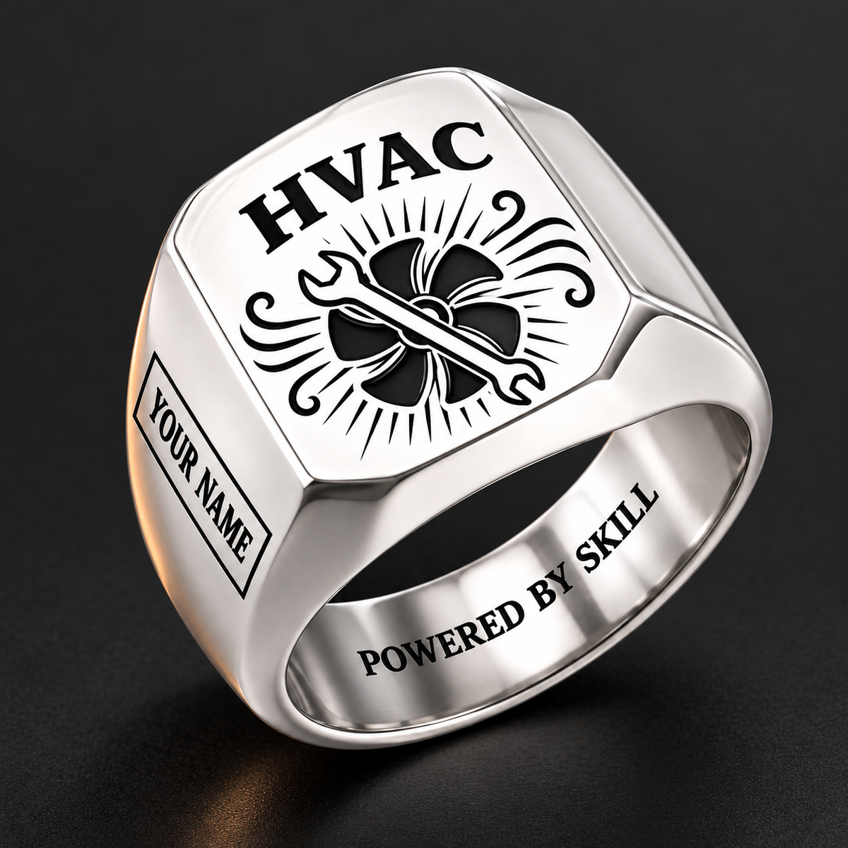 Silver HVAC Sunburst Legacy signet ring featuring a fan and service wrench surrounded by sunburst lines and flowing-air flourishes, with a boxed name area, with illustrative YOUR NAME and POWERED BY SKILL