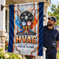 HVAC proud legacy house flag displayed on a porch beside an adult HVAC professional