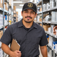 Personalized HVAC Minimal Gold Emblem Baseball Cap worn by an adult HVAC technician during a break