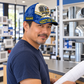 Personalized HVAC Blueprint Geometry Baseball Cap worn by an adult HVAC technician during a break