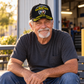Personalized HVAC Never Underestimate Baseball Cap worn by an adult HVAC technician during a break