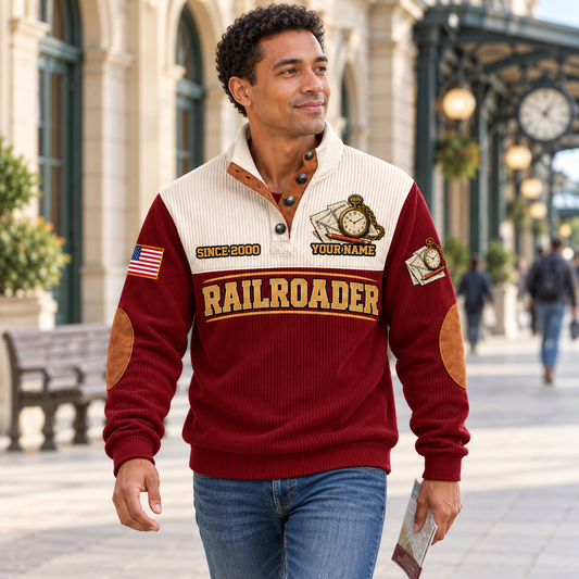 Adult wearing the Jujube Red Railroader Plan Route Roll sports sweatshirt while walking through a public station concourse