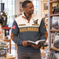Adult wearing the grey Railroader Built With Care sports sweatshirt in a safe off-duty railway-inspired setting