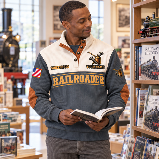 Adult wearing the grey Railroader Built With Care sports sweatshirt in a safe off-duty railway-inspired setting