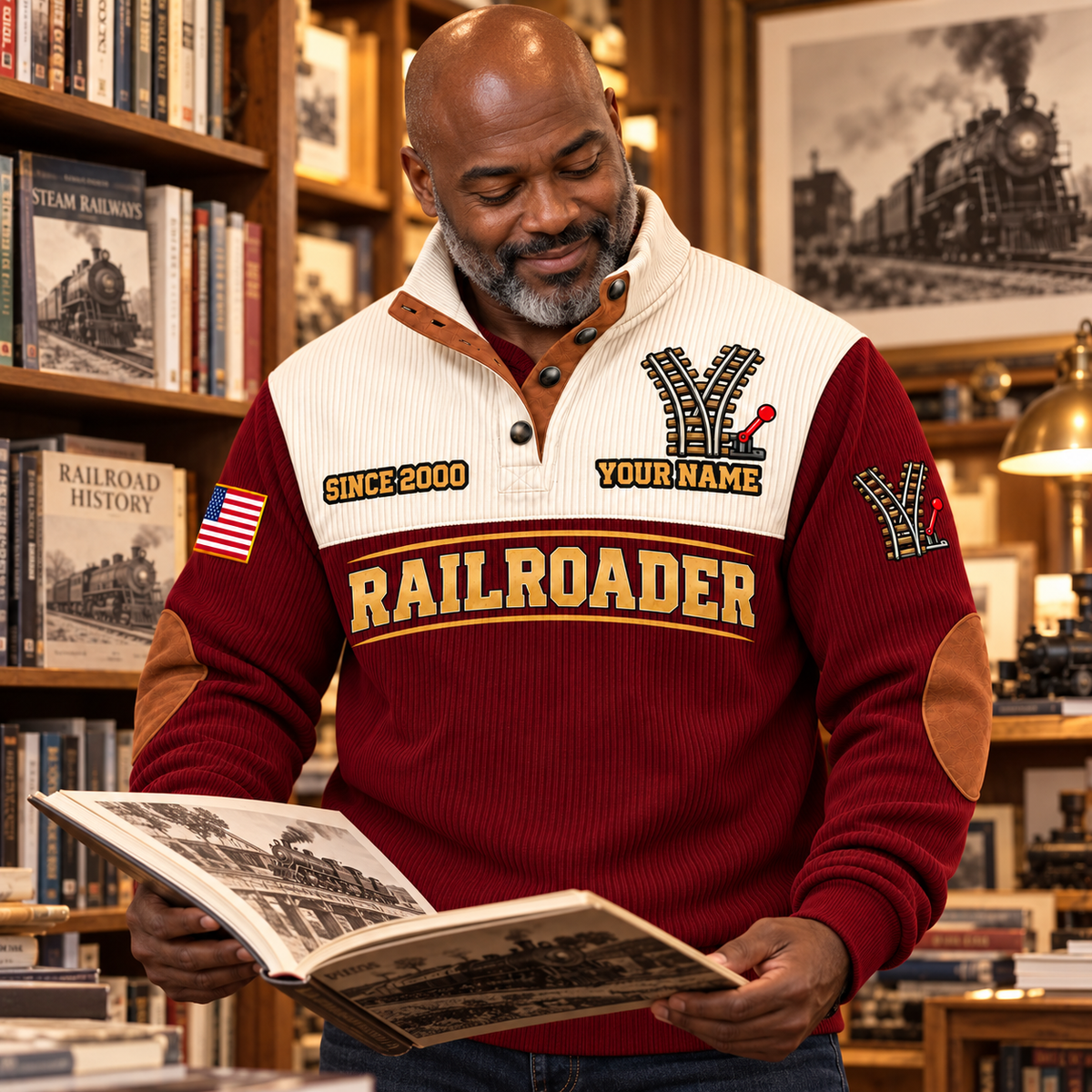 Personalized Railroader Track Perfection Sports Sweatshirt — Jujube Red, broad-shouldered bald adult with a short grey beard, standing and browsing a railway-history bookshop