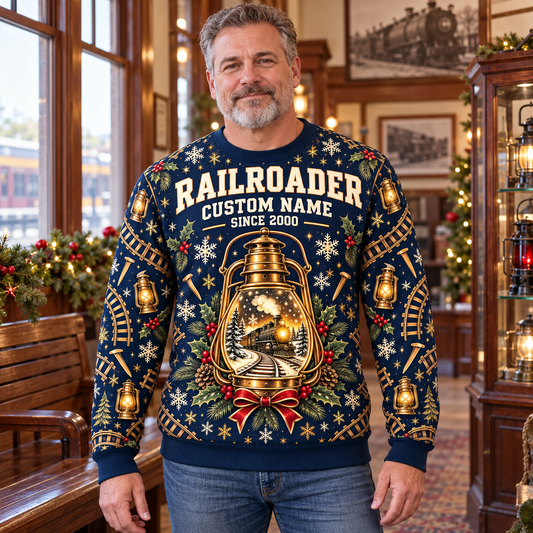 Adult wearing the Railroader Holiday Lantern crewneck sweater in a restored railway depot lounge