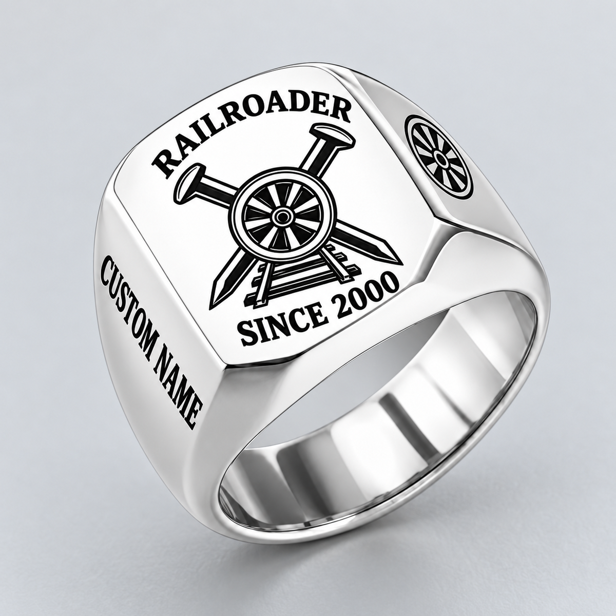 Silver Railroader Classic Emblem Name and Year ring with railway wheel, crossed spikes and track artwork and illustrative CUSTOM NAME and SINCE 2000