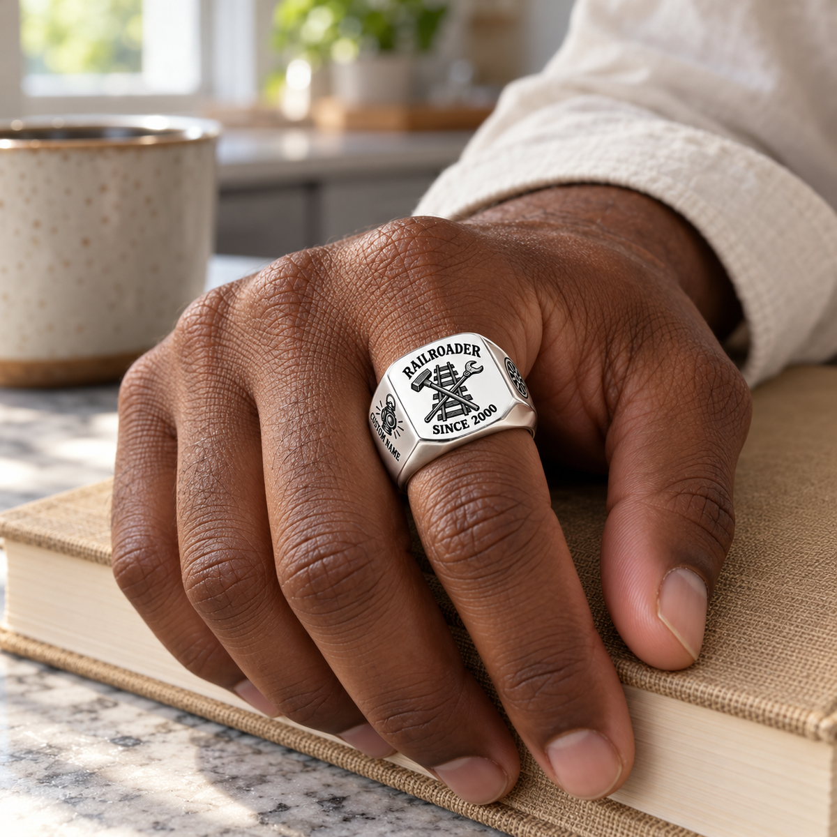 Silver Railroader Heritage Emblem ring worn in a safe off-duty setting