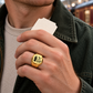 Gold Railroader Split Emblem ring worn in a safe off-duty railway-themed leisure setting