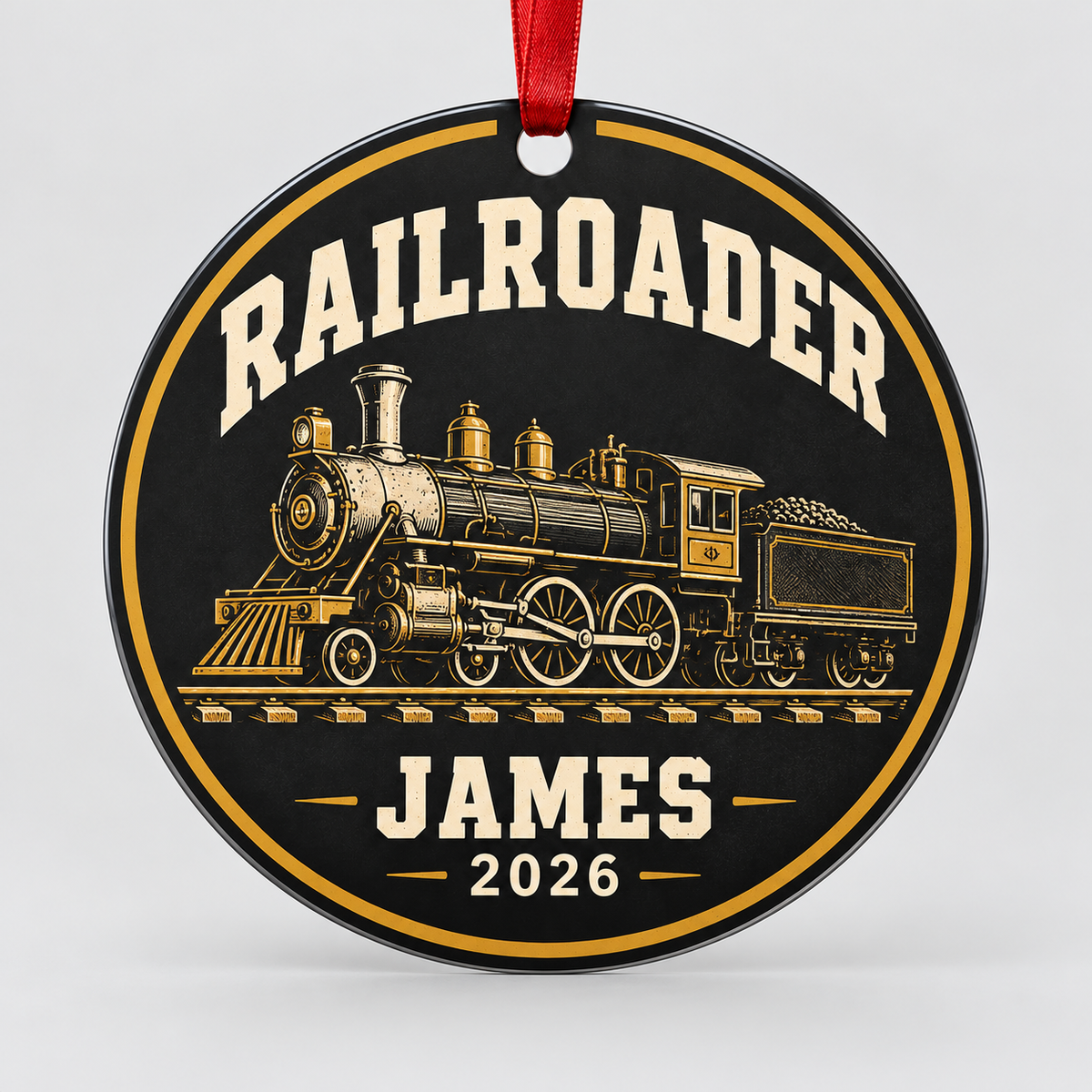Standalone Railroader round aluminum ornament concept with printed locomotive, JAMES 2026 and red ribbon; not a sample photo