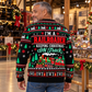 Adult showing the back of a Railroader Keeping Christmas On Track sweater in a railway museum holiday display